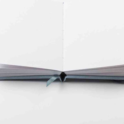 DARWI Skizzenbuch mit Gummizug A6 80 Blatt 140g hellblau